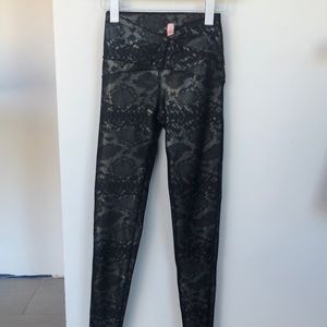 Maaji full length legging in black with metallic diamond design. Crossover front